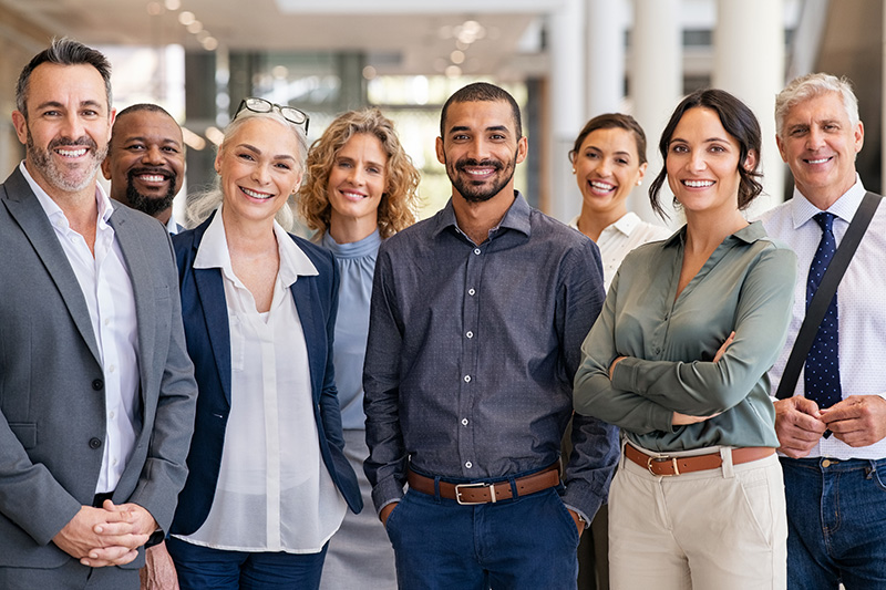 image of a happy team smiling at the camera